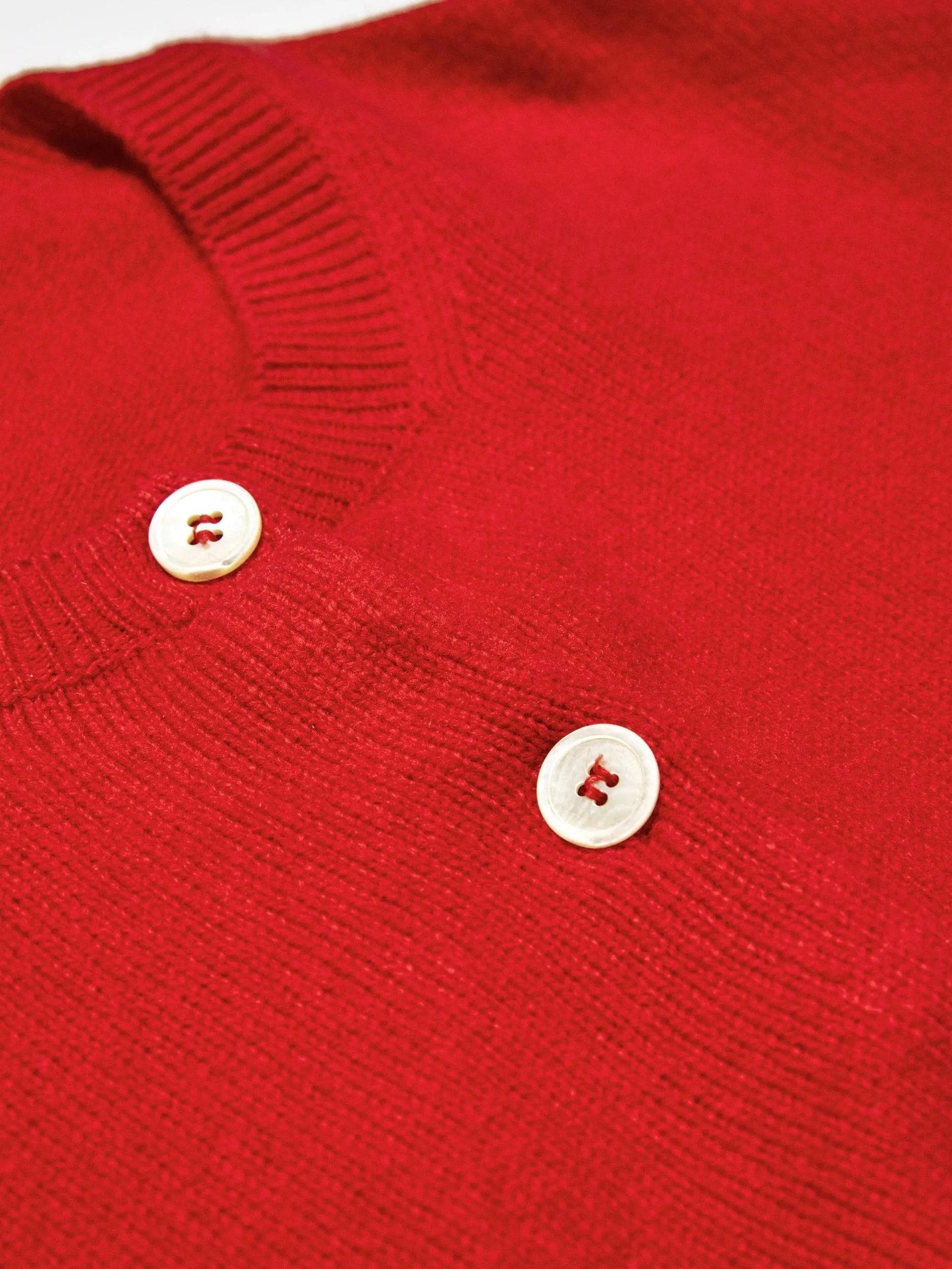 Ada Geelong crewneck cardigan in poppy red