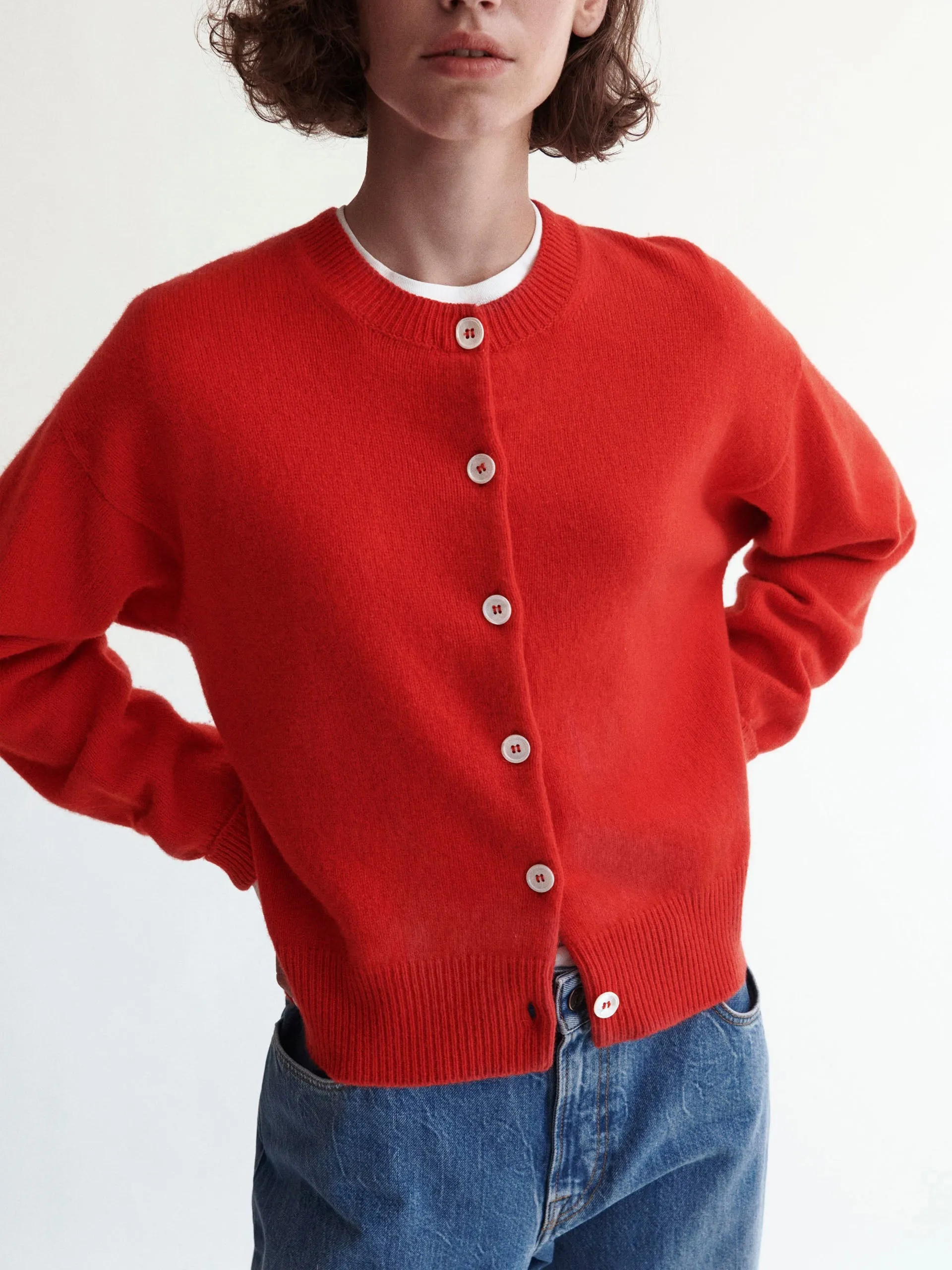 Ada Geelong crewneck cardigan in poppy red